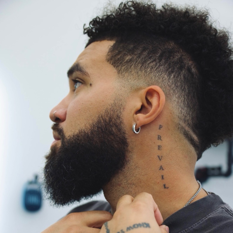 Levy The Barber in profile.